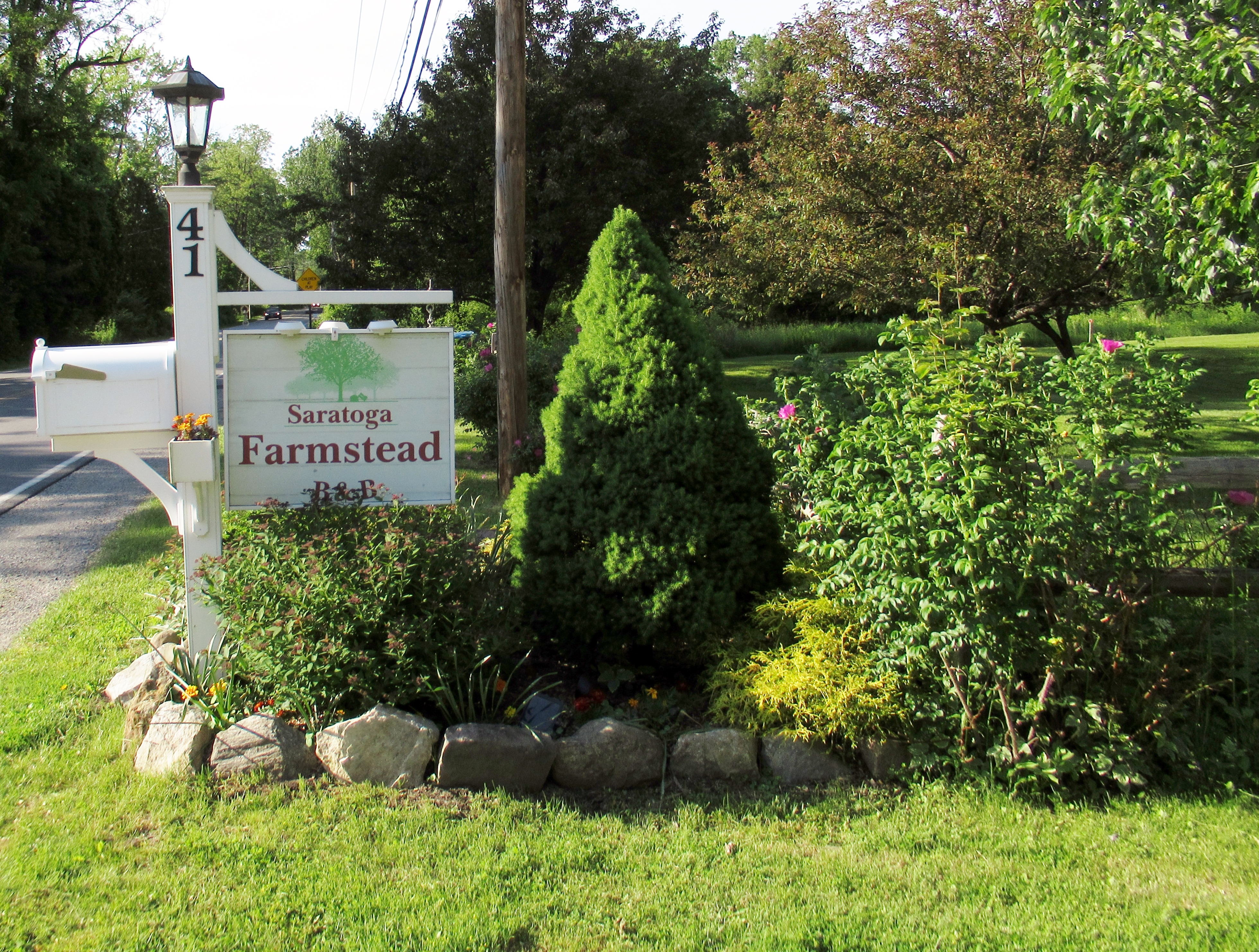 The Saratoga Farmstead sign on 41 Locust Grove Rd | Near Lake George | Adirondacks | Saratoga Farmstead B&B