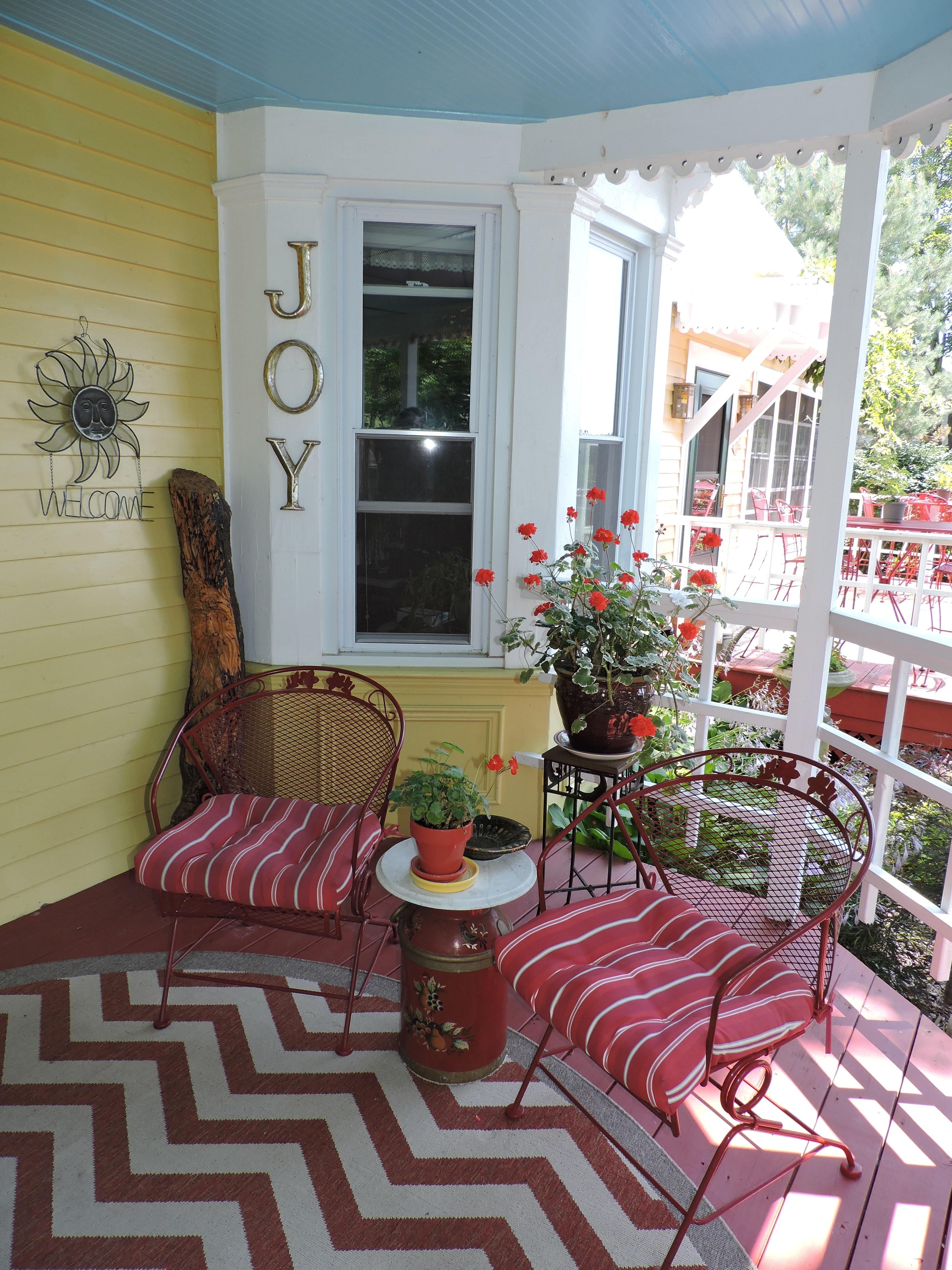Joy letters in the wall above two chairs | Near Lake George | Adirondacks | Saratoga Farmstead B&B